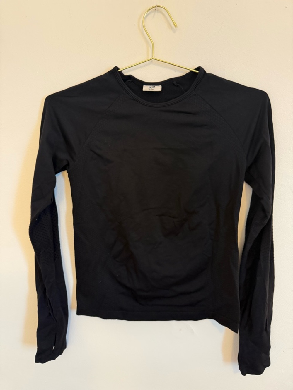Long sleeved, breathable athletic top